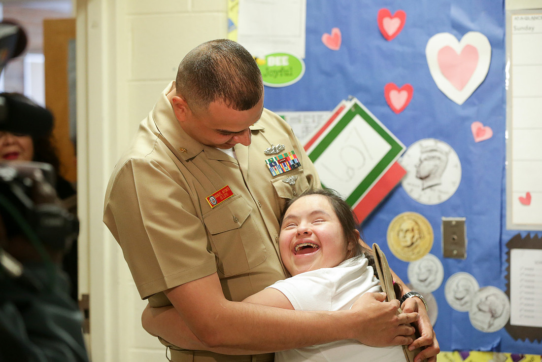 Navy Fathers Surprise homecoming