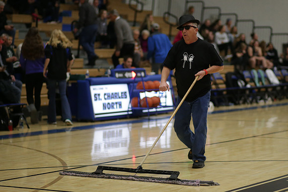 Blues Brother Sweeping the gym floor at St. Charles North HS